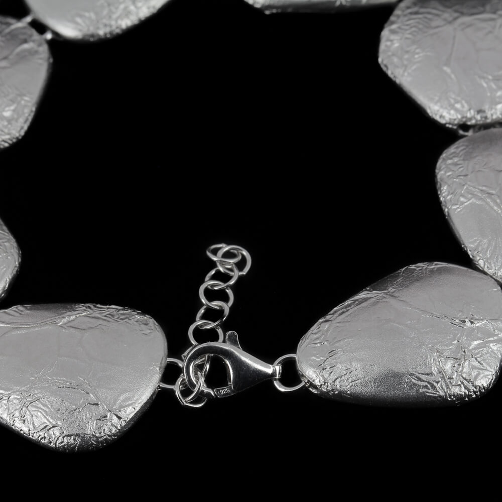 Zilver en matte schakelarmband met design van koffieboon