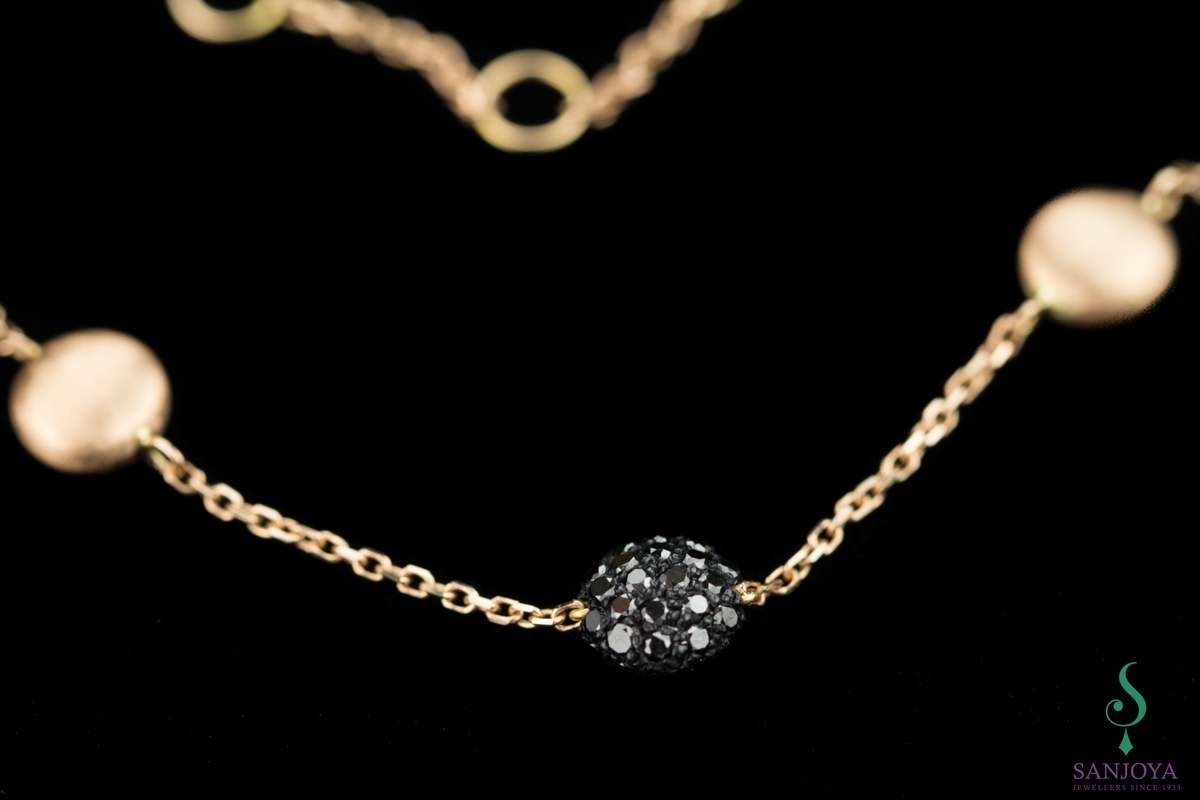 Refined rosé bracelet from 18kt with black diamond