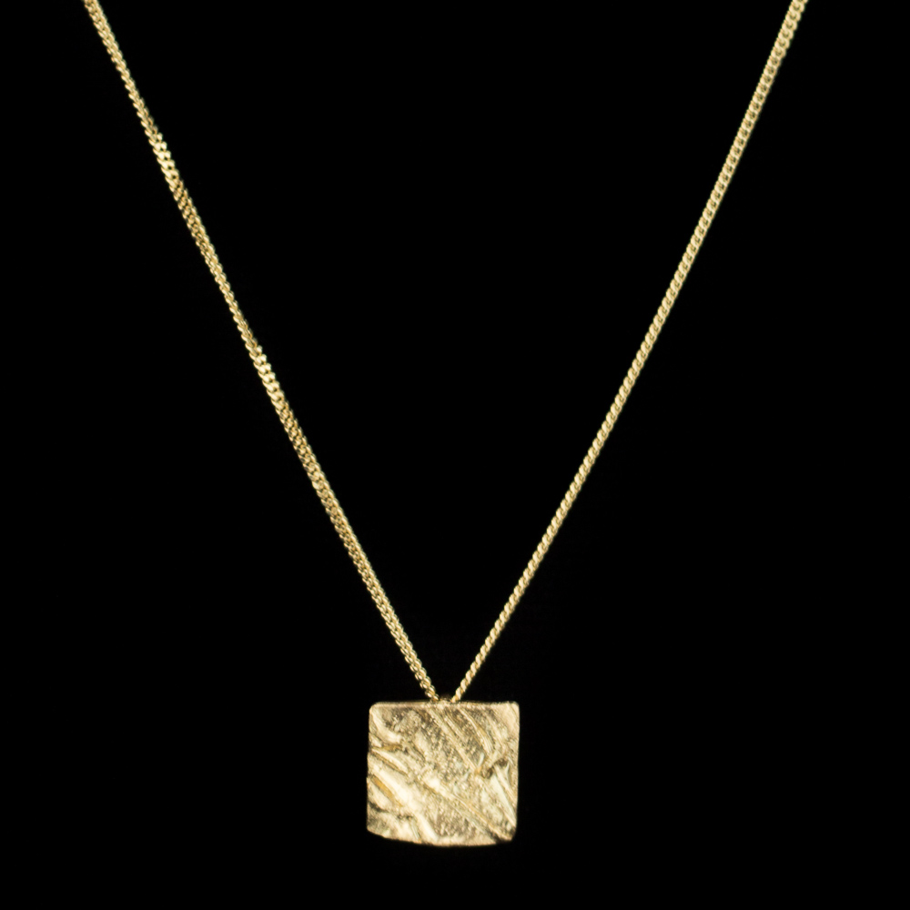 Yellow 18kt square and diamonded pendant; with chain