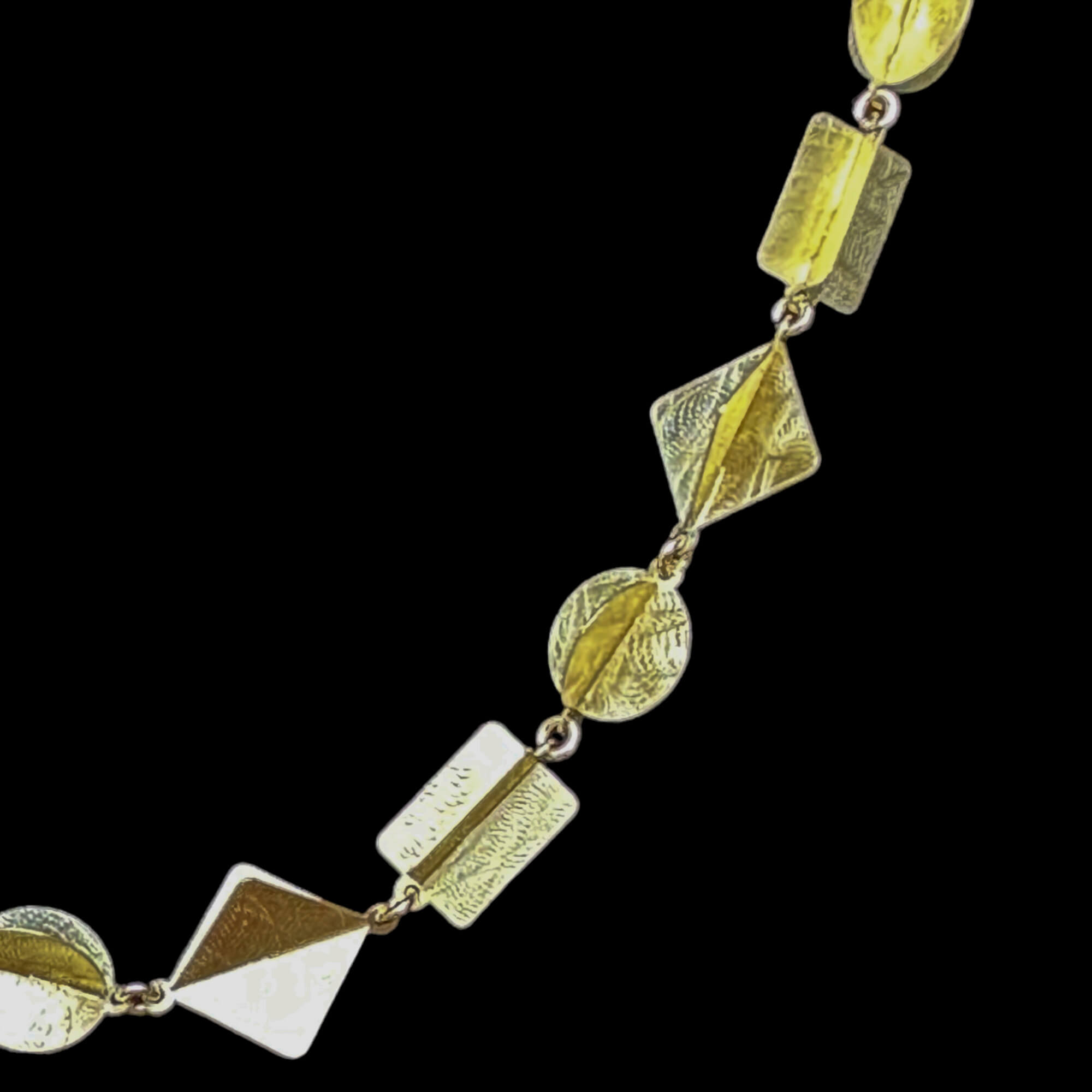 Multi-shaped necklace made of gold-plated silver