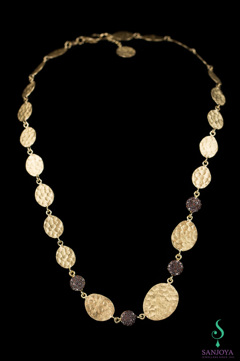 Mat gold plated necklace with brown zirconia stones