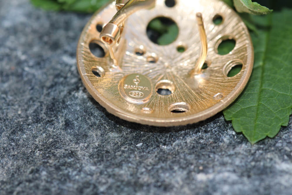 Refined gold plated earrings with crafted glare