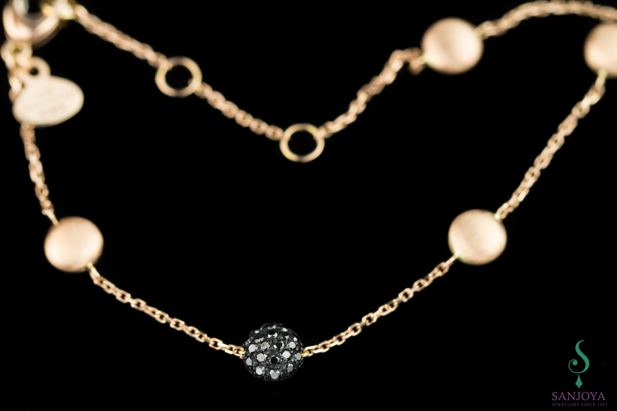 Refined rosé bracelet from 18kt with black diamond