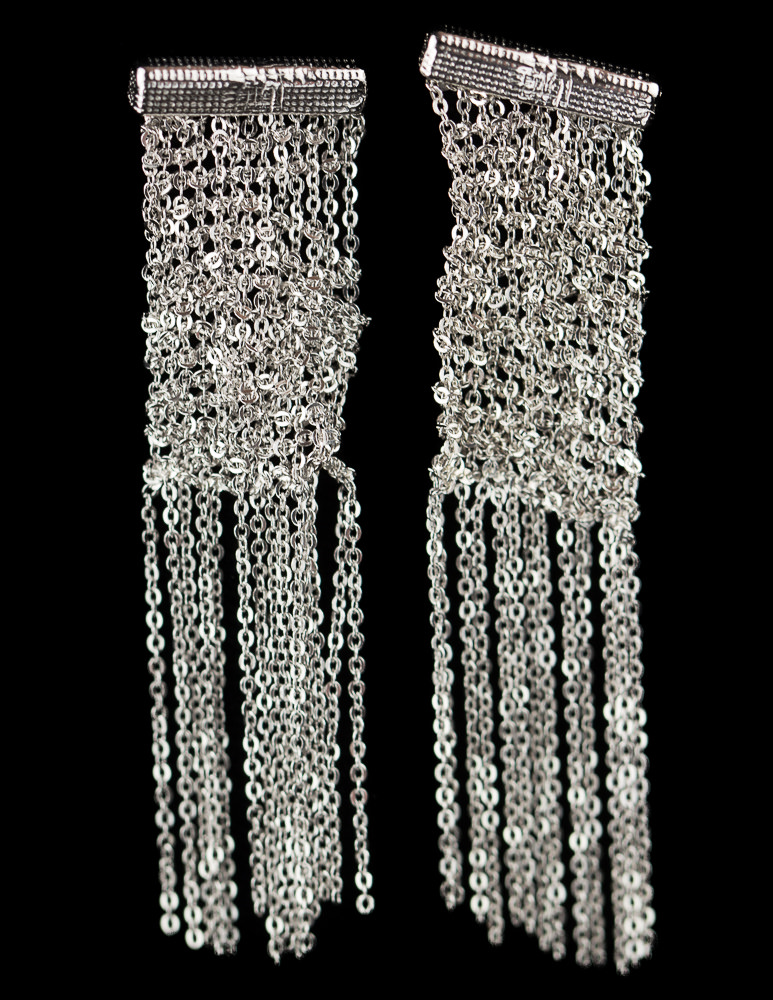 Silver earrings of several short chains. narrow version