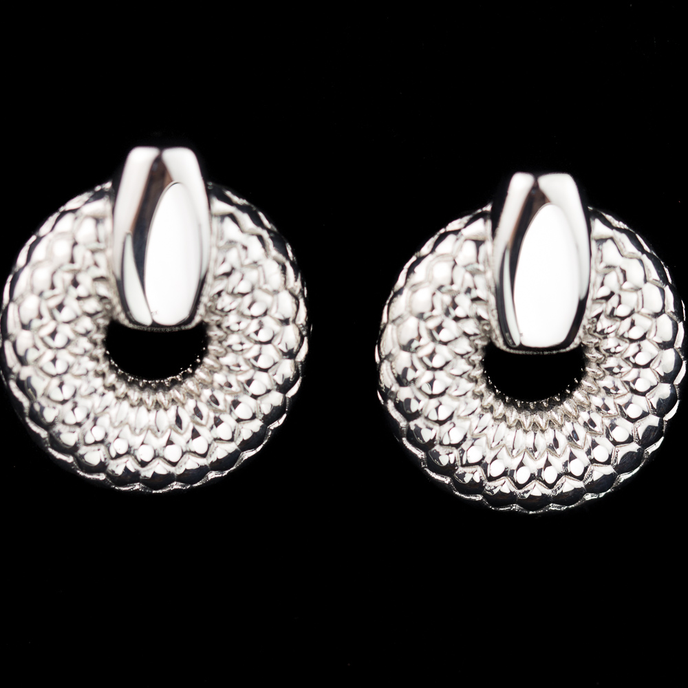 Crafted silver and round earrings