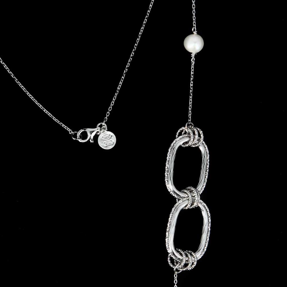 Carved and long silver necklace with pearls