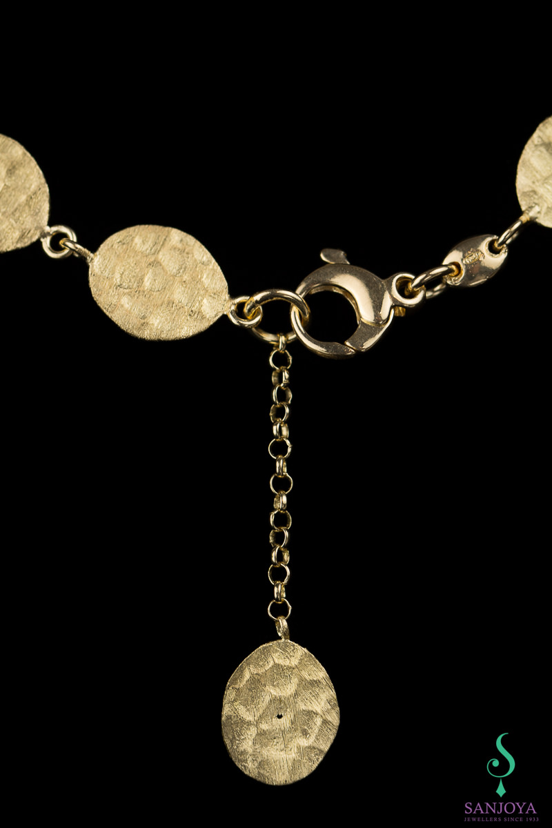 Mat gold plated necklace with brown zirconia stones
