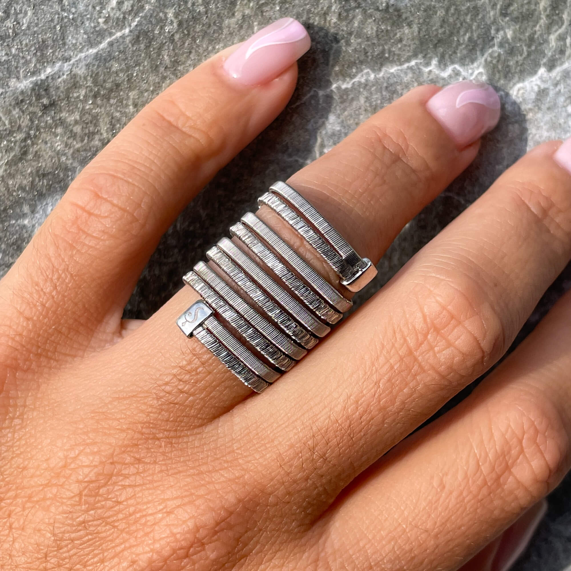 Silver and wide multi-wire ring