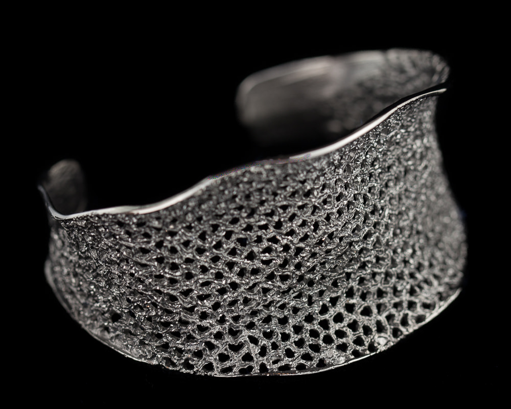Refined silver gray bangle with flare