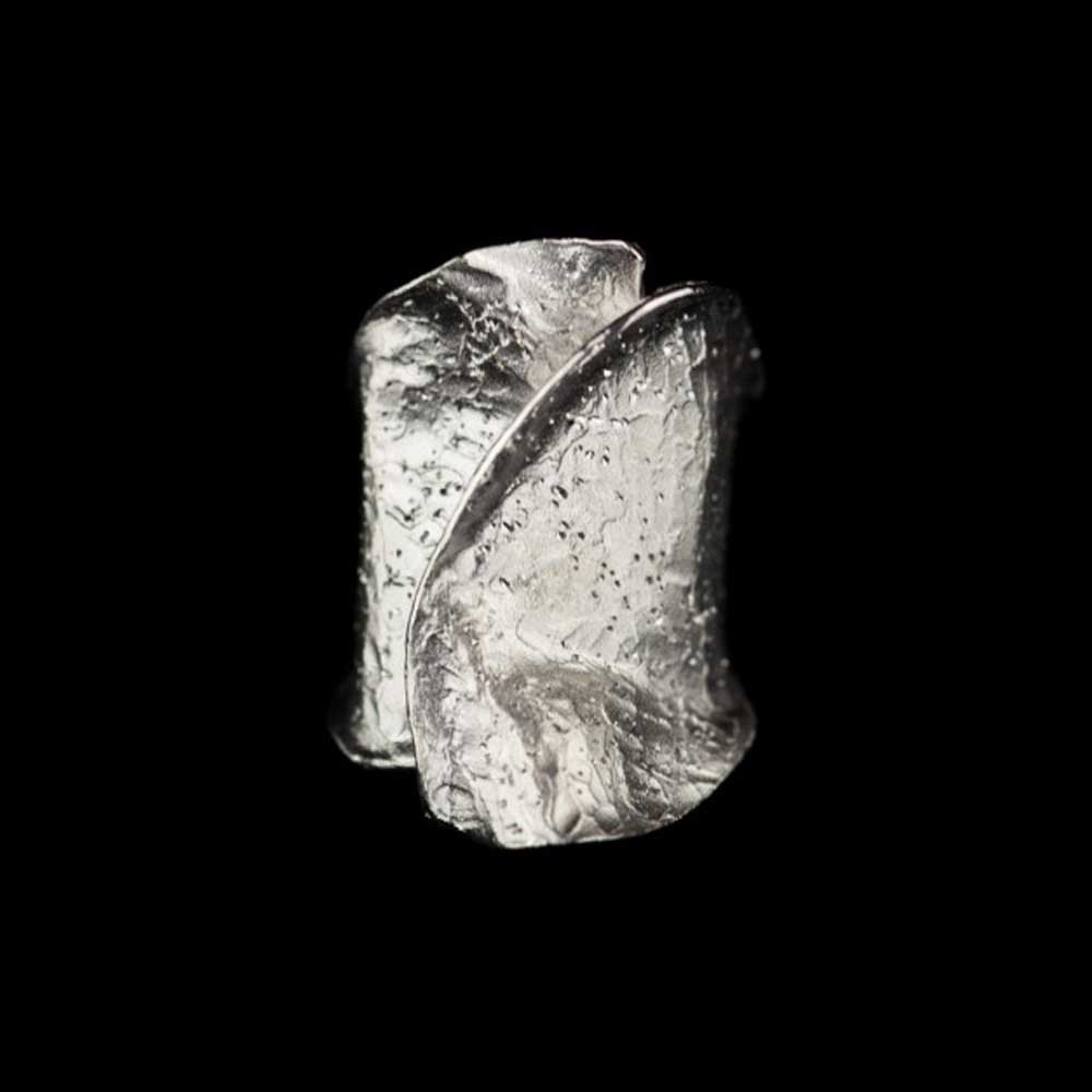 Silver diamond ring with glare
