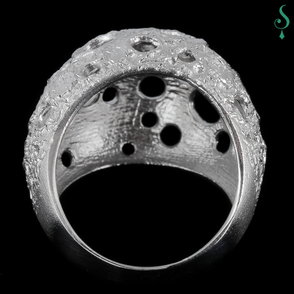 Processed and silver spherical ring