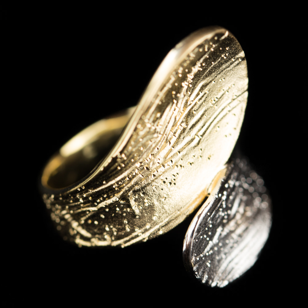 Two-tone diamond tipped ring; goldplated and silver