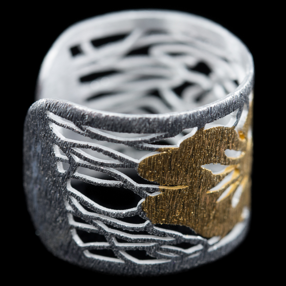 ES1014002 - Zilveren ring met vergulde bloem