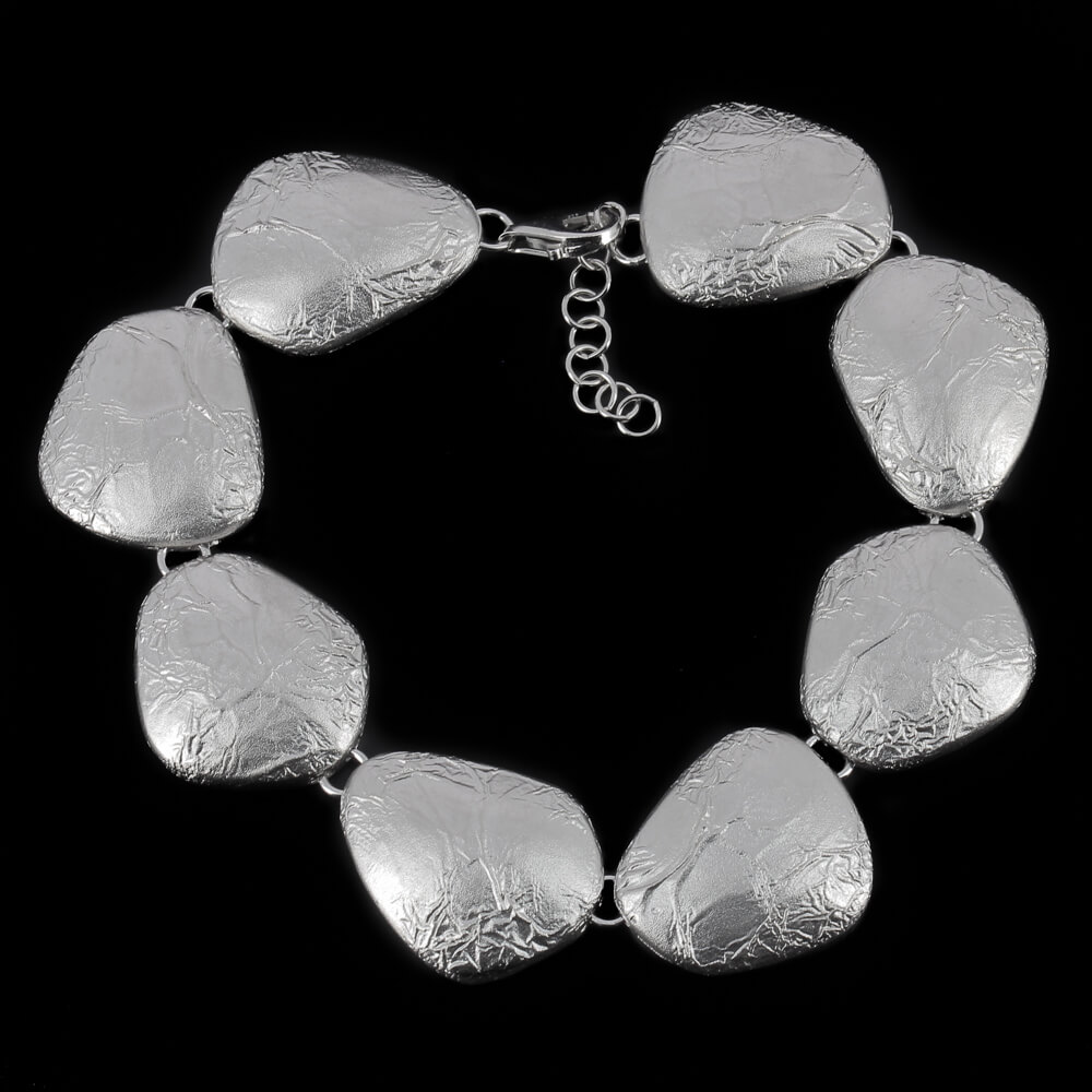 Zilver en matte schakelarmband met design van koffieboon