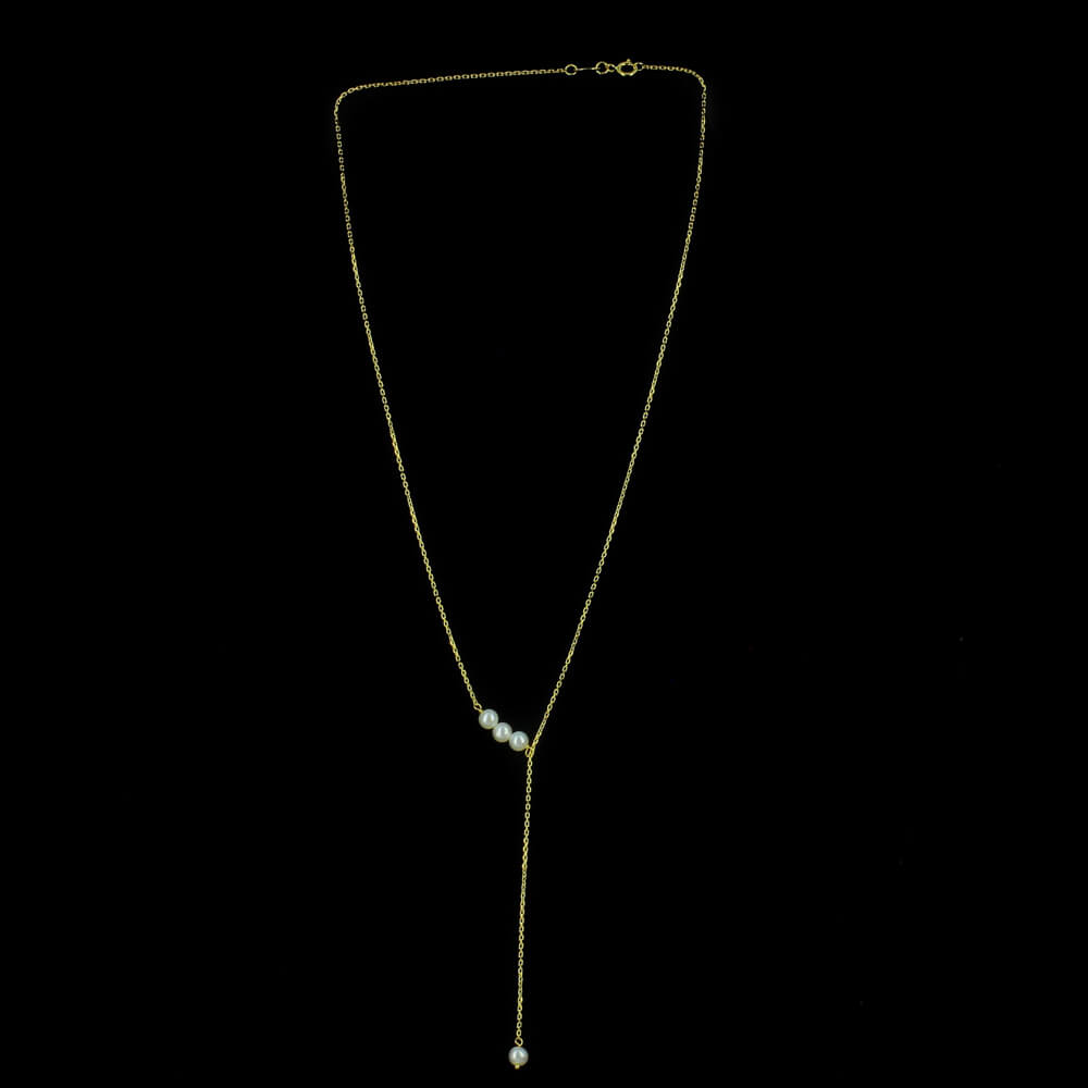 Piercing yellow gold necklace 18Kt with some gems