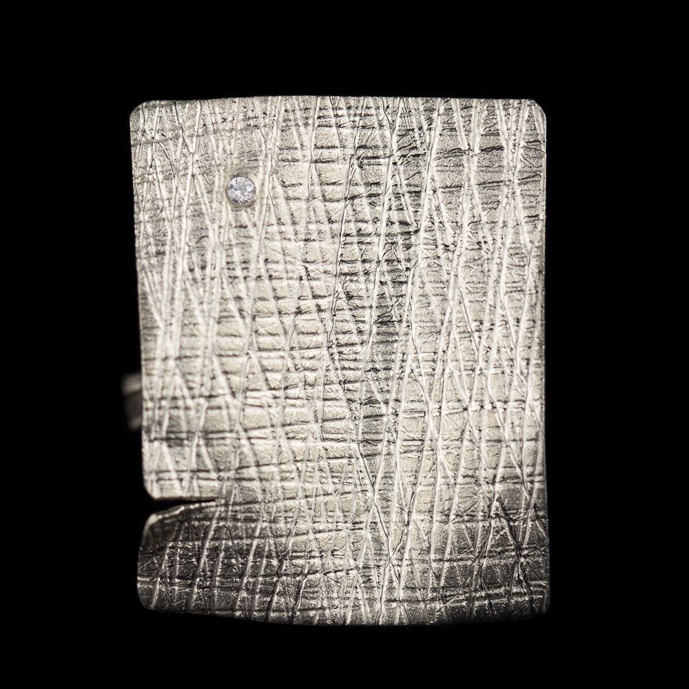 ORI1016003Z - Zilveren rechthoekige ring met zirkonia steentje