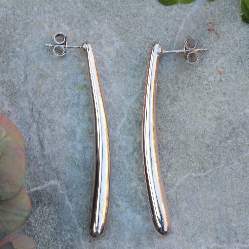 Polished silver long earrings