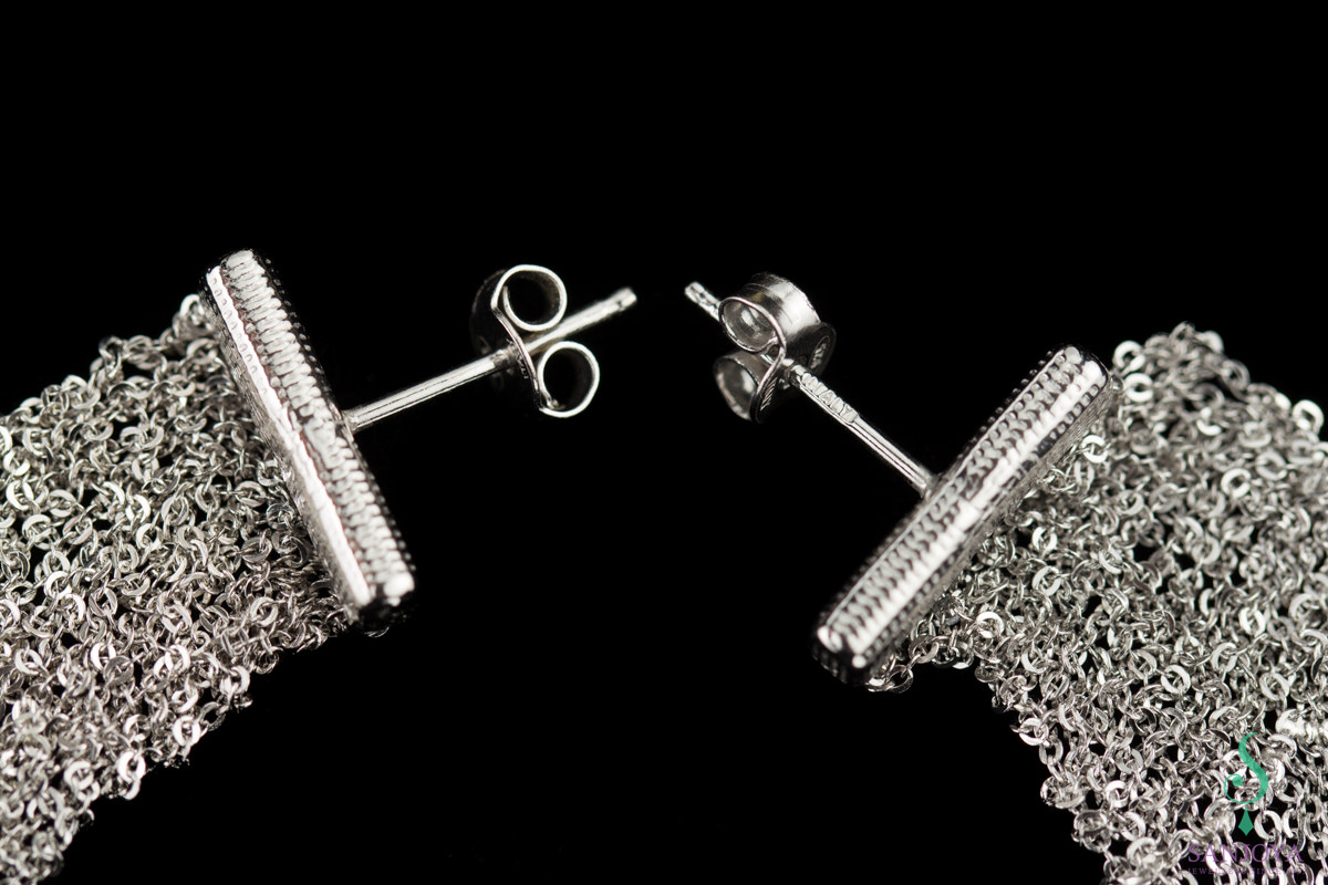 Silver earrings of several short chains. narrow version