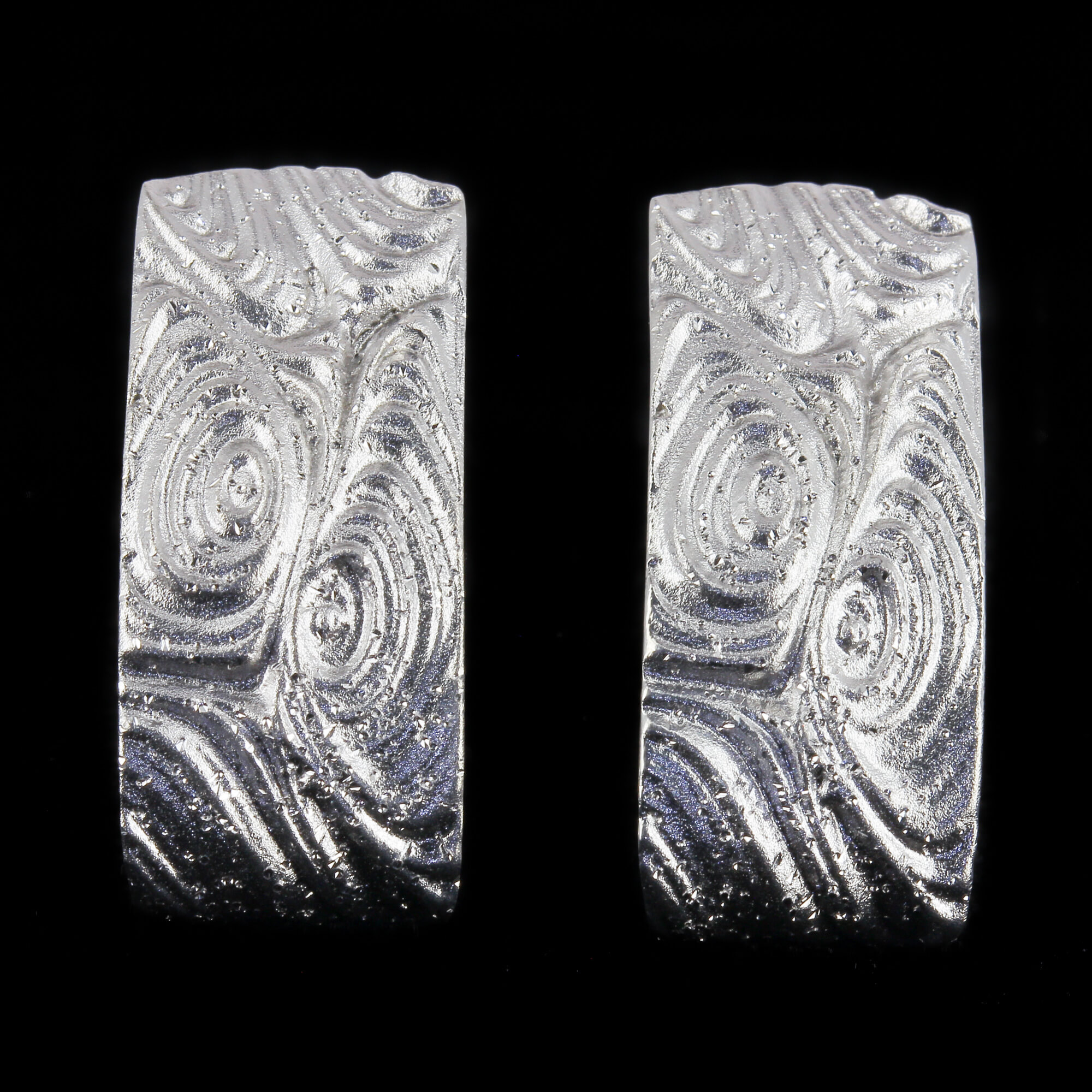 Worked and silver oblong earrings