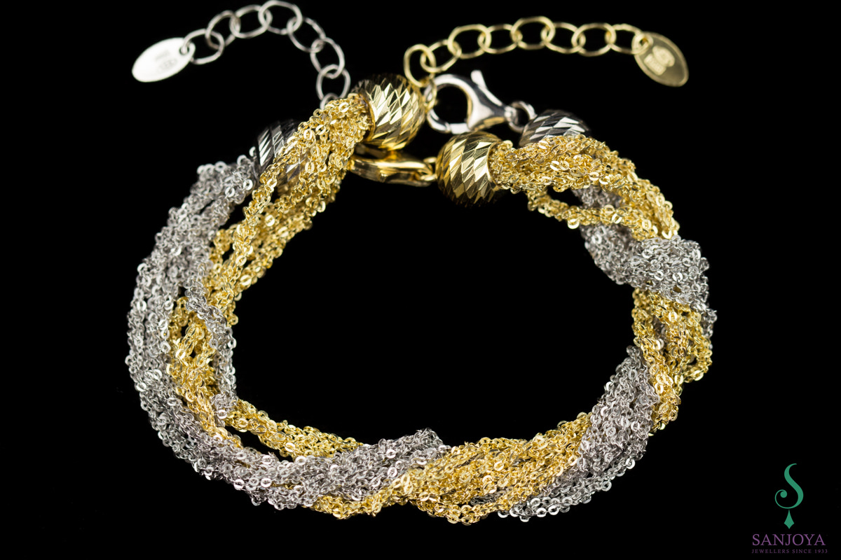 Four beautiful interwoven silver bracelets