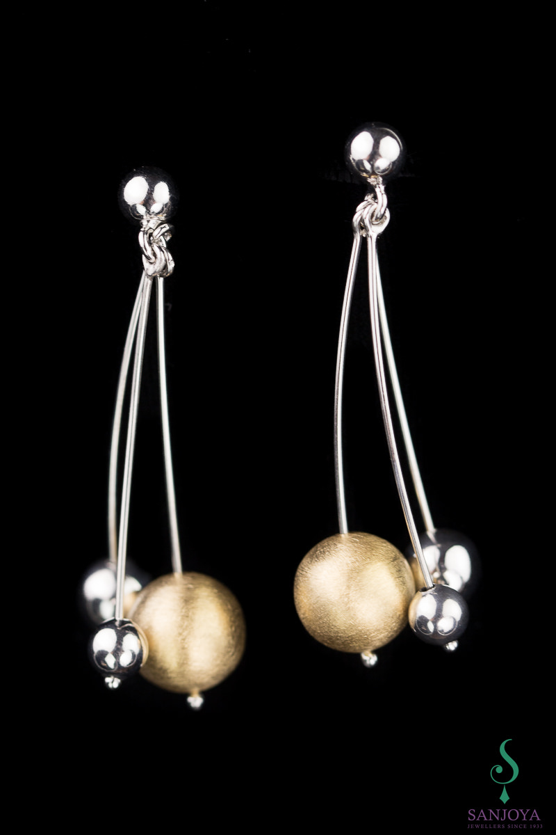 Two-tone silver long earrings with decorations