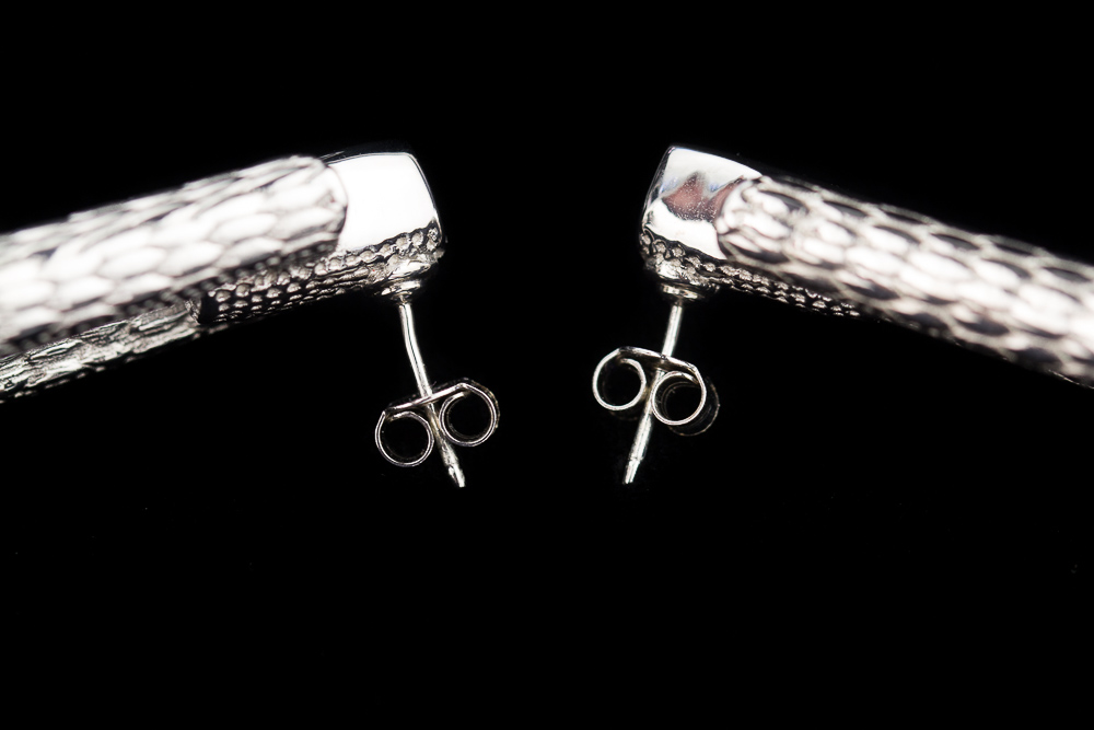 Rectangular and processed silver earrings