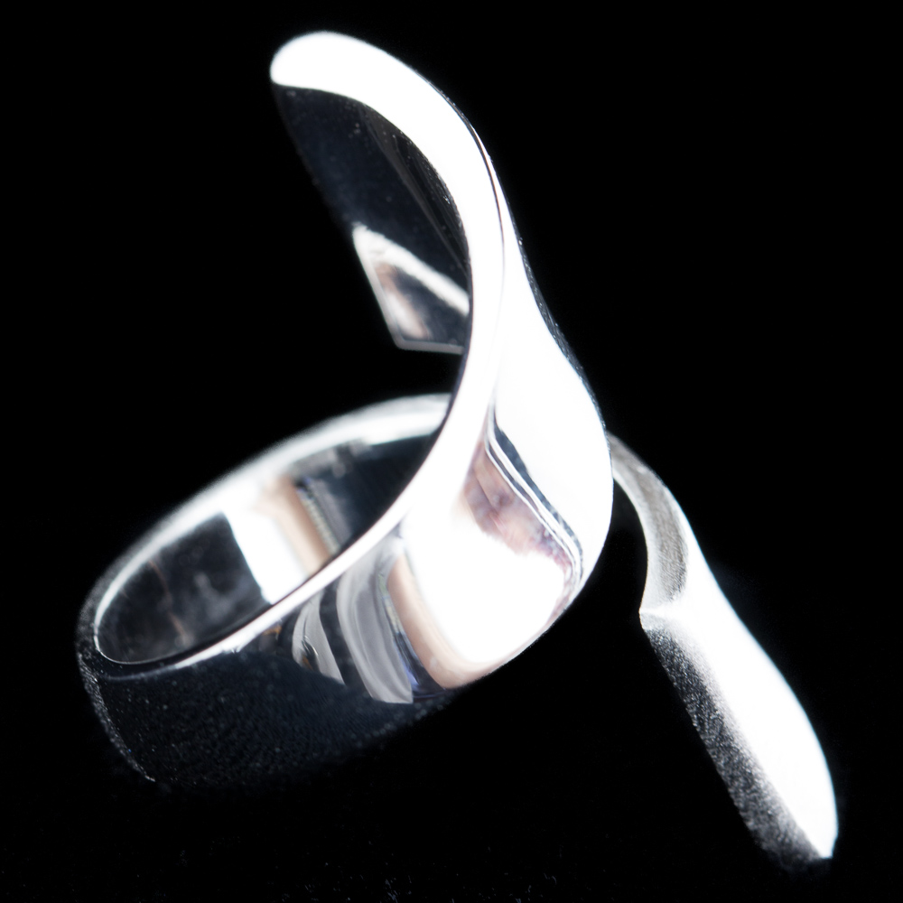 Silver matt and shiny ring with a curl