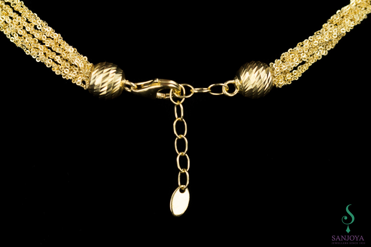 Four interwoven chains of gold plated silver