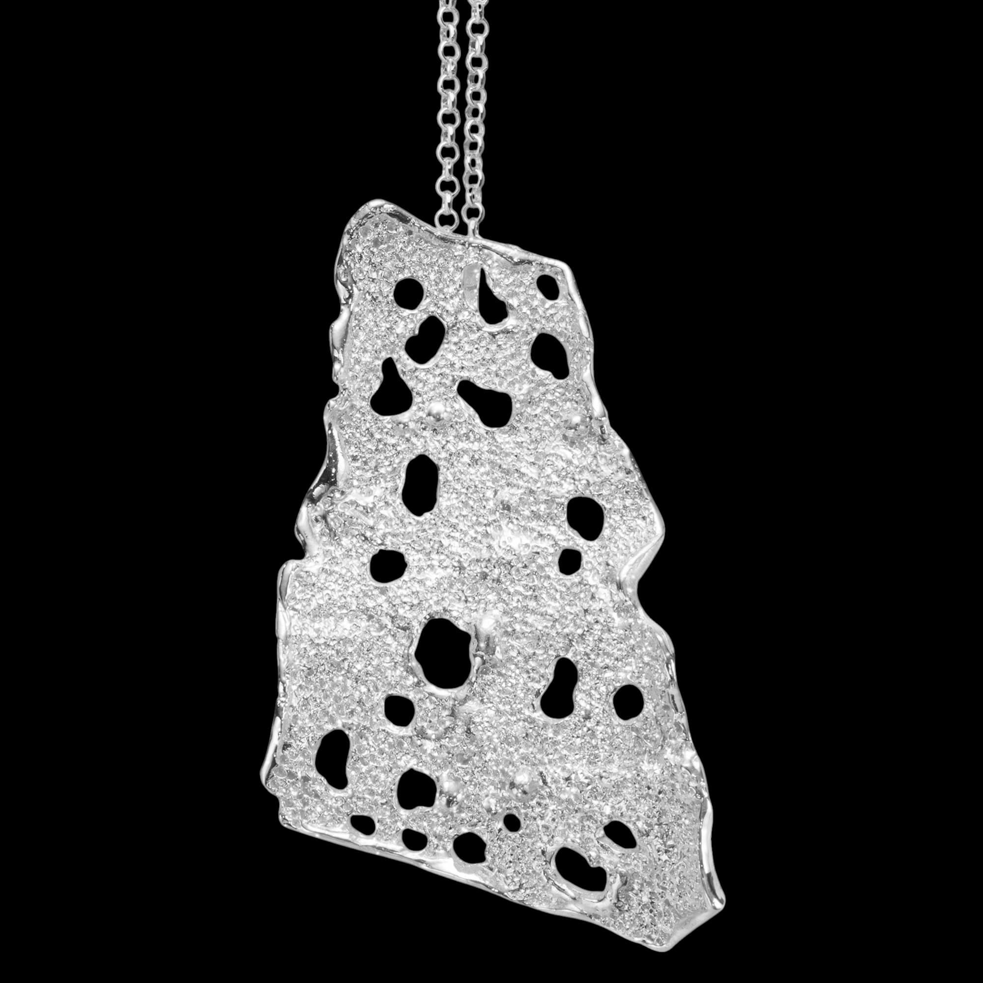 Elongated Artistic Silver Pendant