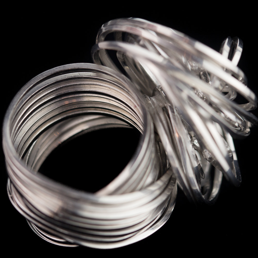 Elegant stiff multi-wire curl ring of sterling silver