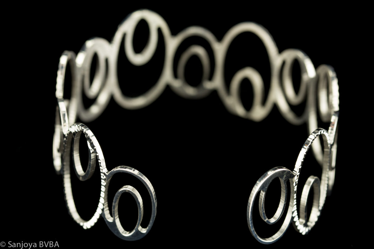 Silver oval-shaped slave bracelet