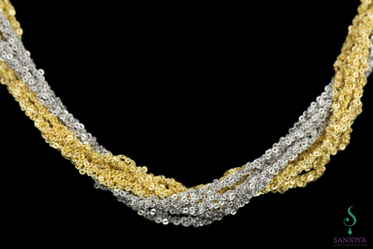 Four interwoven chains of gold plated silver