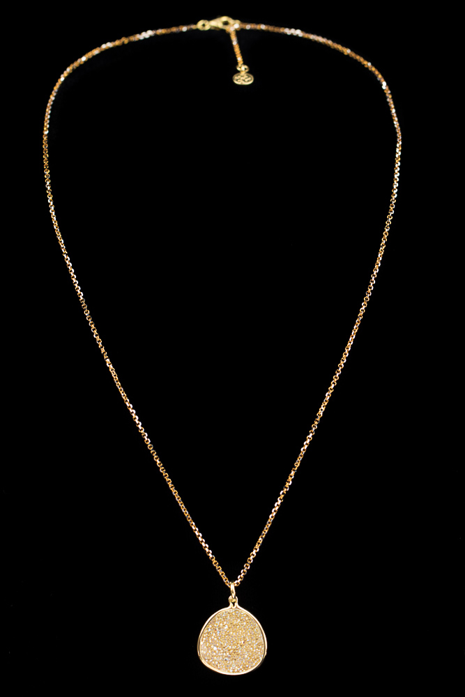 Gold plated necklace with oval pendant of white crystals