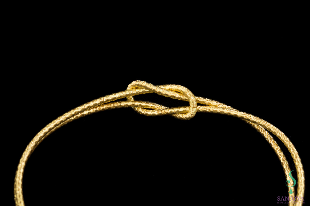 Refined goldplated bracelet with an infinity knot, 2mm