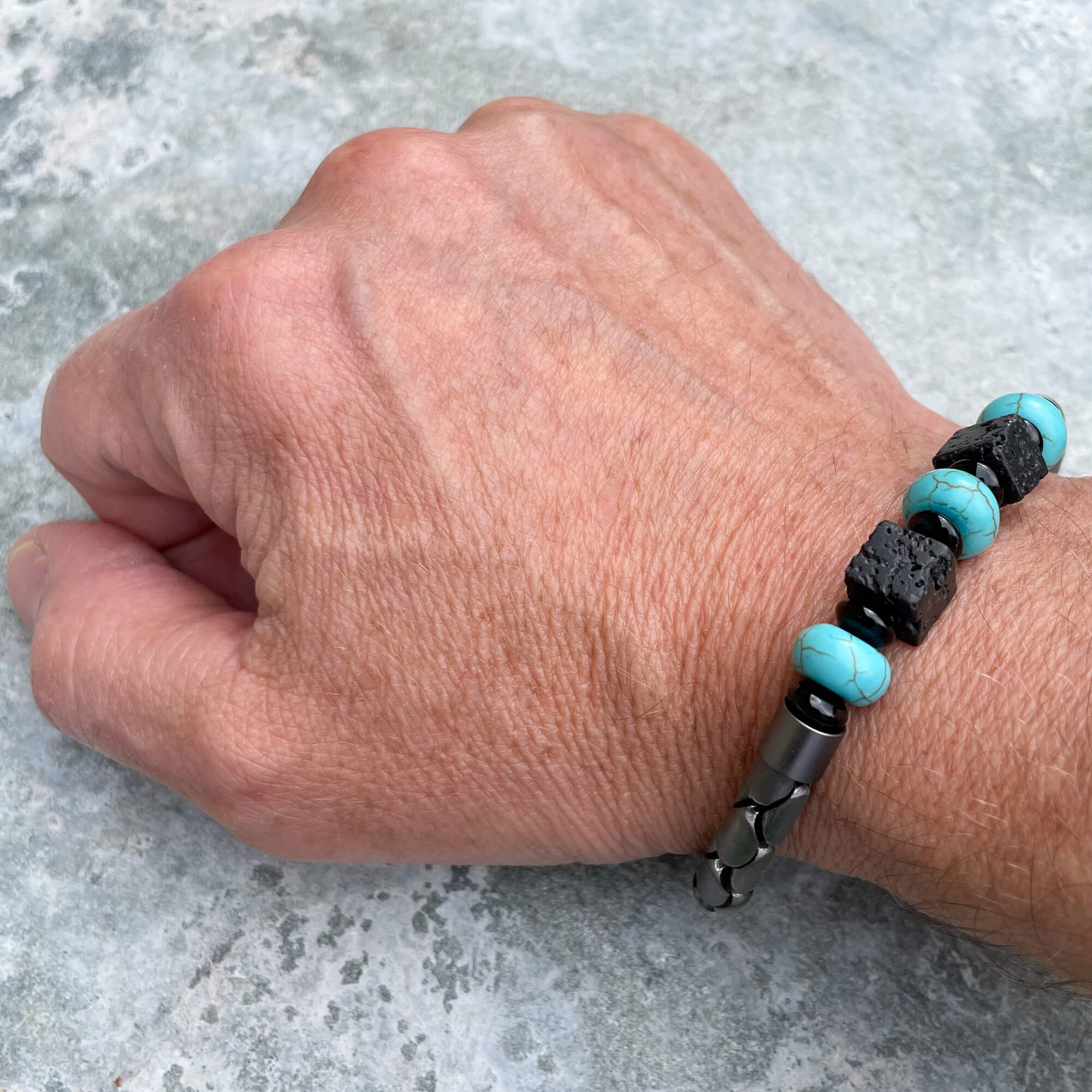 Gray bracelet with turcuoise and black stones