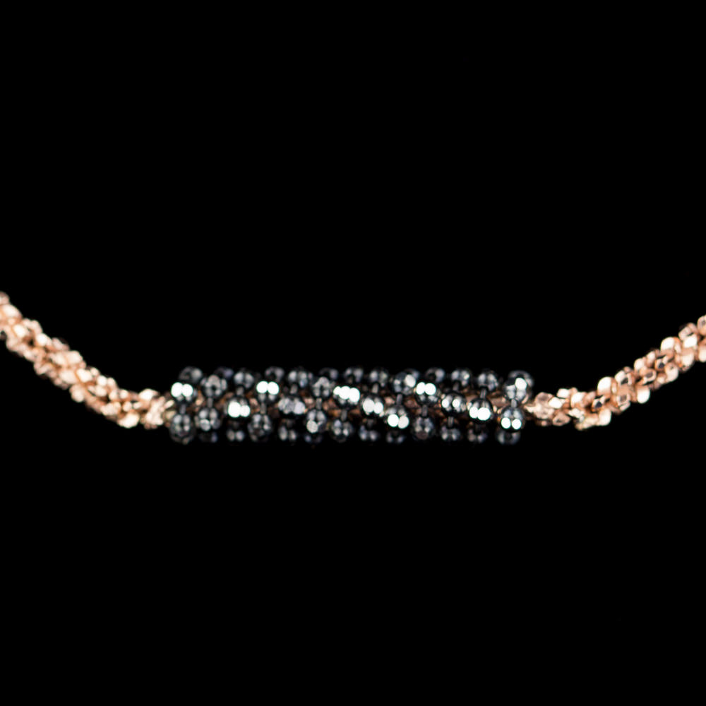 Rose gold necklace with black sparkling pendant