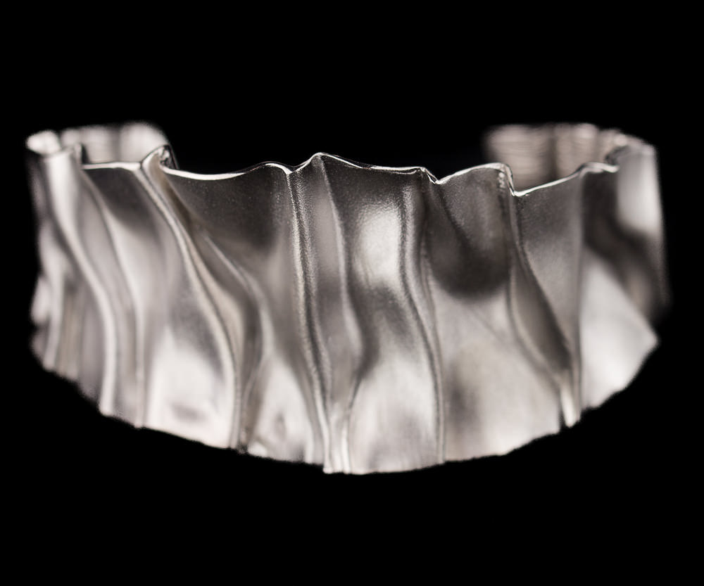 Matte criminal and narrower sterling silver bracelet