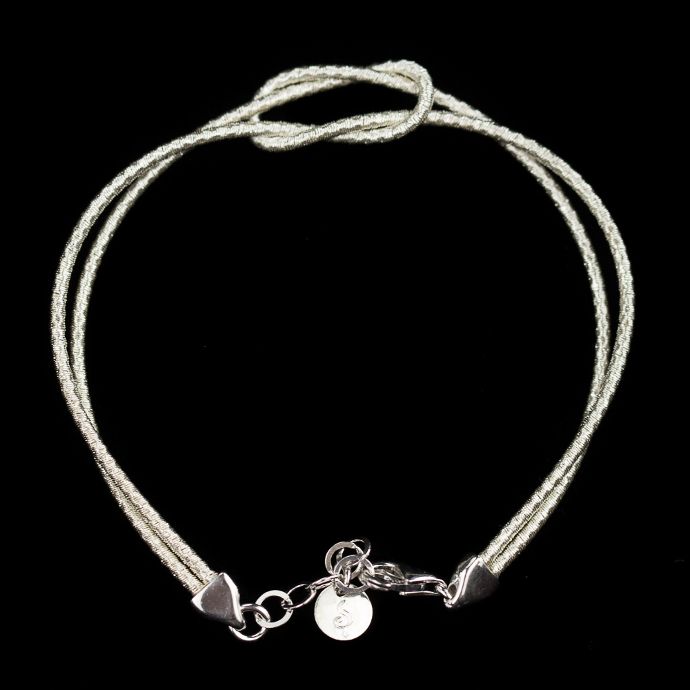 Refined white silver bracelet with an infinity knot; 2mm