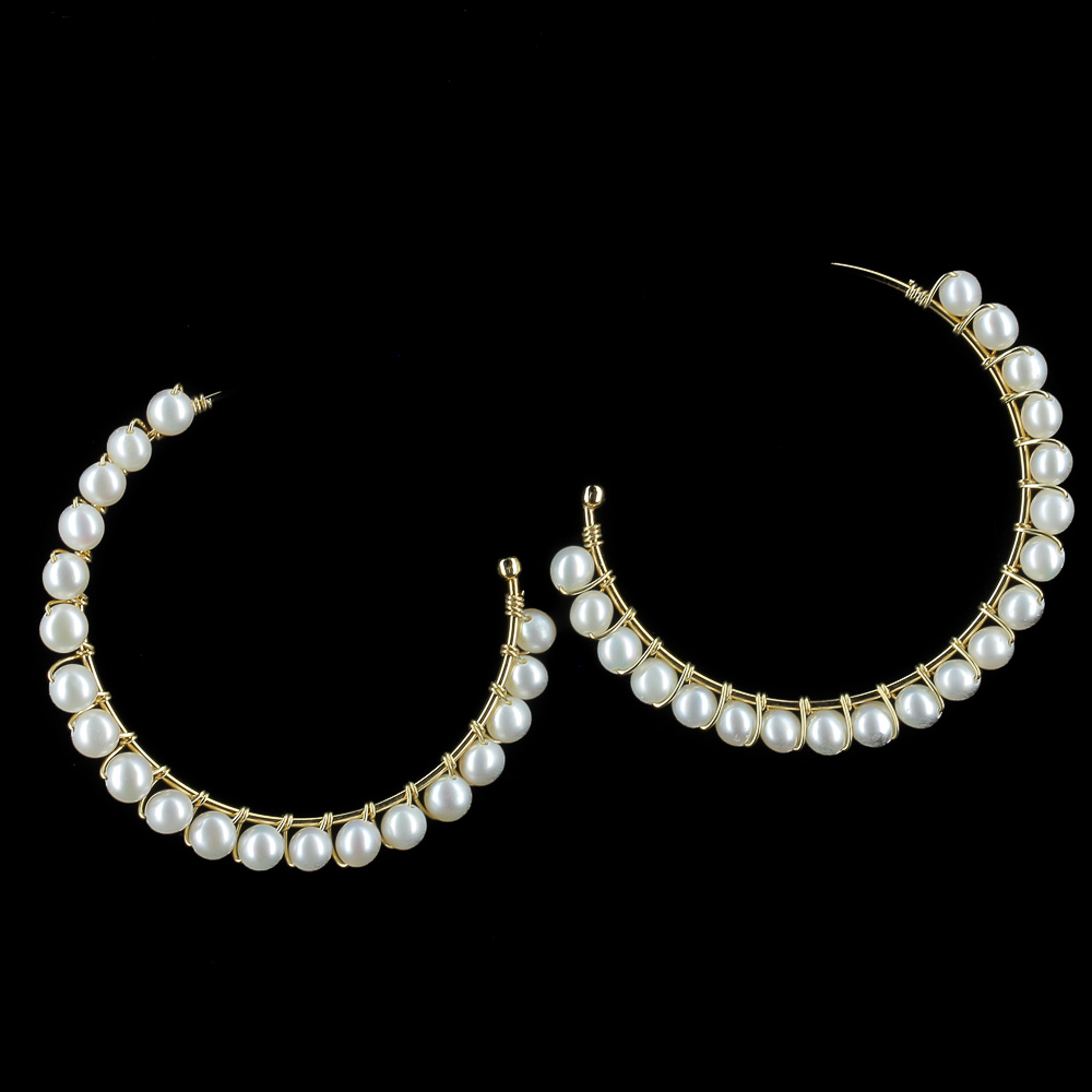 Large gold plated creoles with pearls