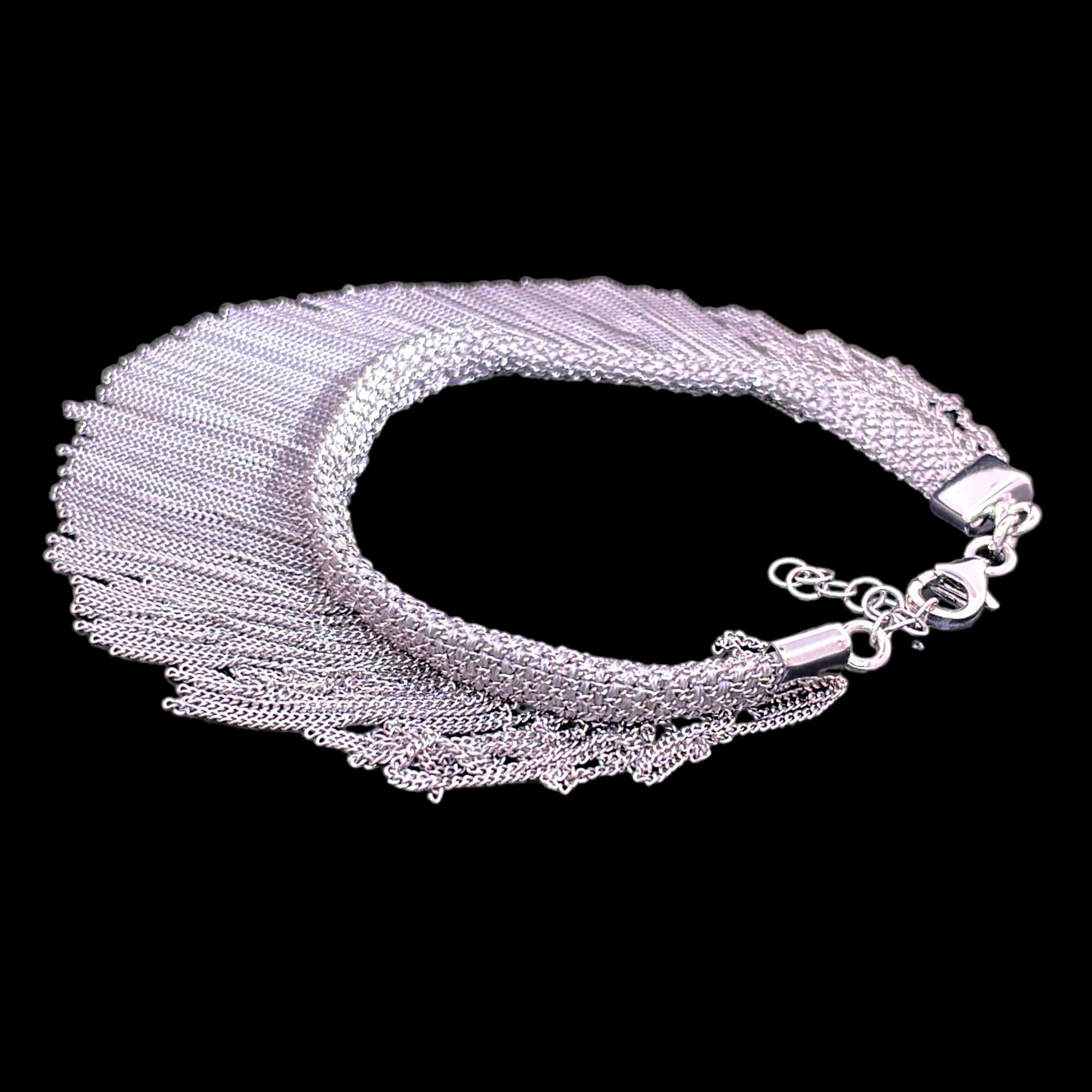 Silver colored bracelet with hanging chains