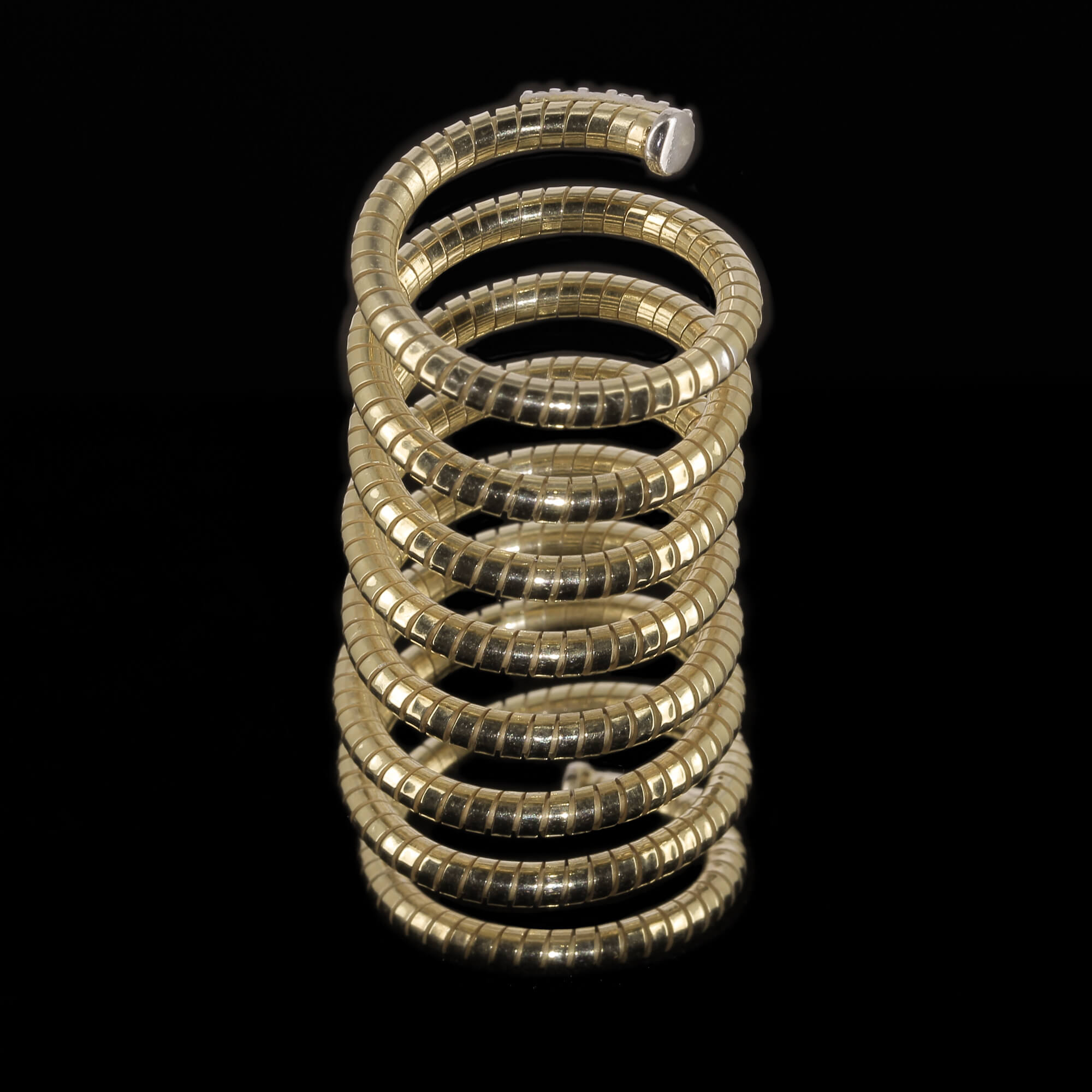 Gold plated and spiral ring with zirconia