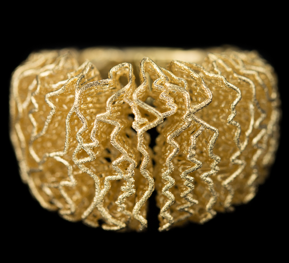 EK0916010 - Fraaie vergulde openbewerkte ring