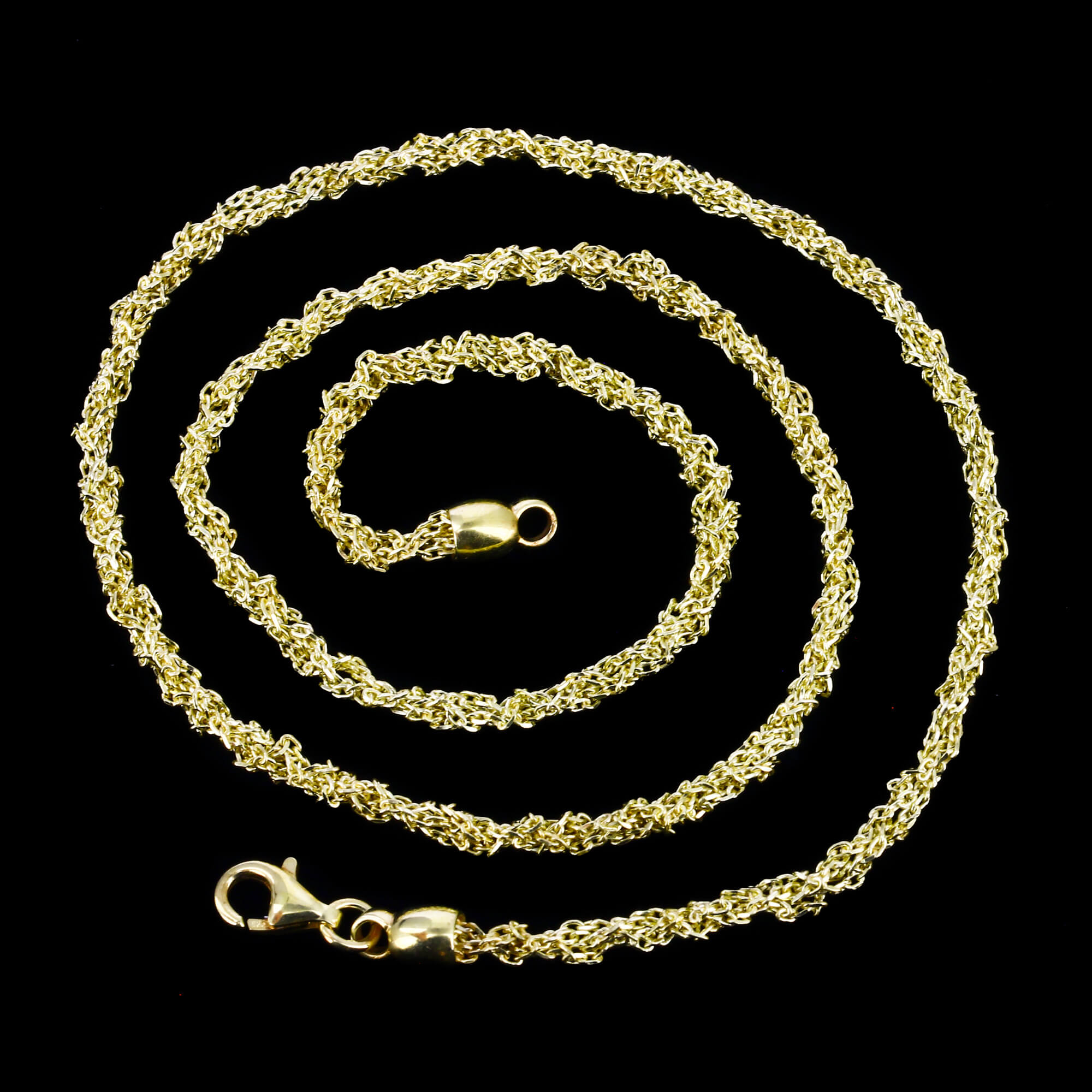 Short interwoven chain of silver gilt