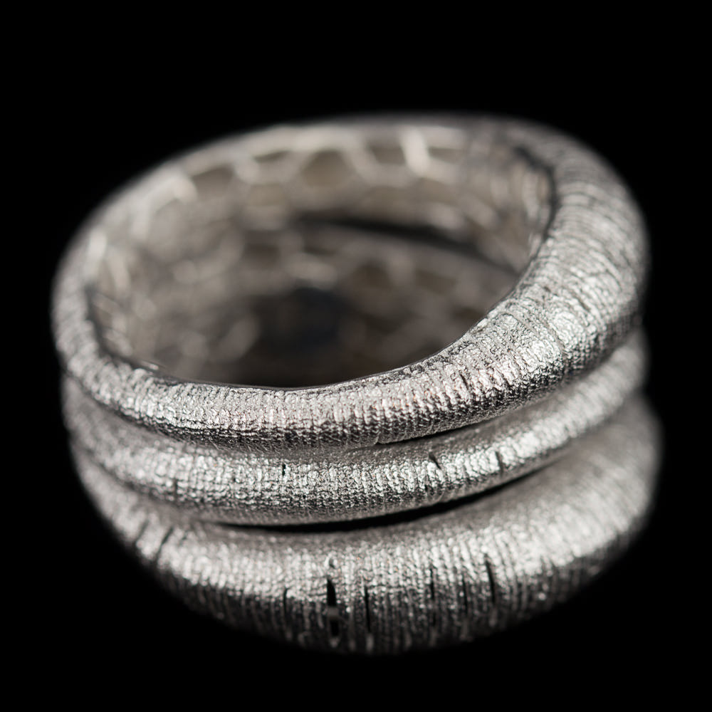 Wide three row silver ring