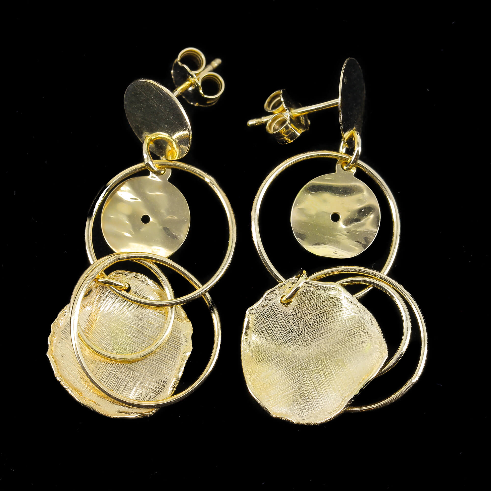 Open and closed round Gilded Shift earrings