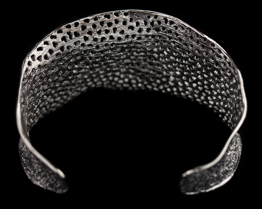 Refined silver gray bangle with flare