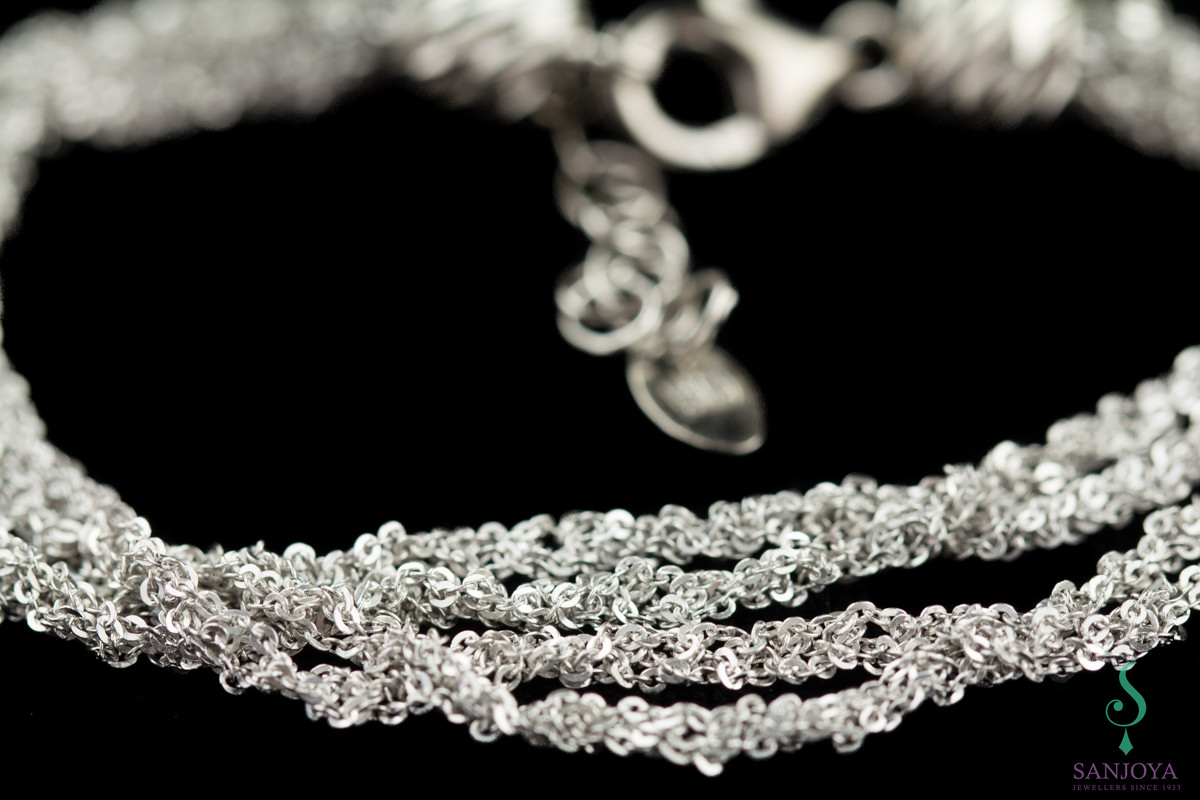 Four beautiful interwoven silver bracelets