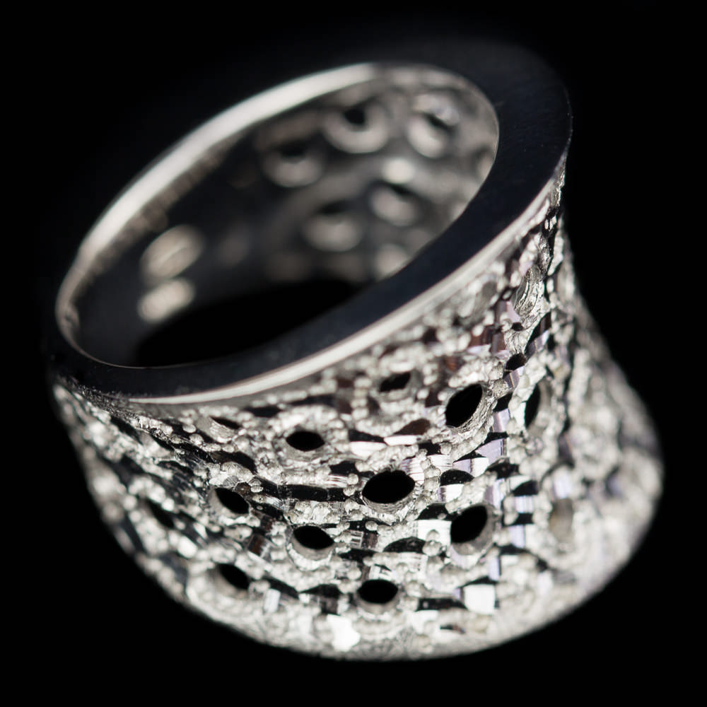 Silver ring with open circles