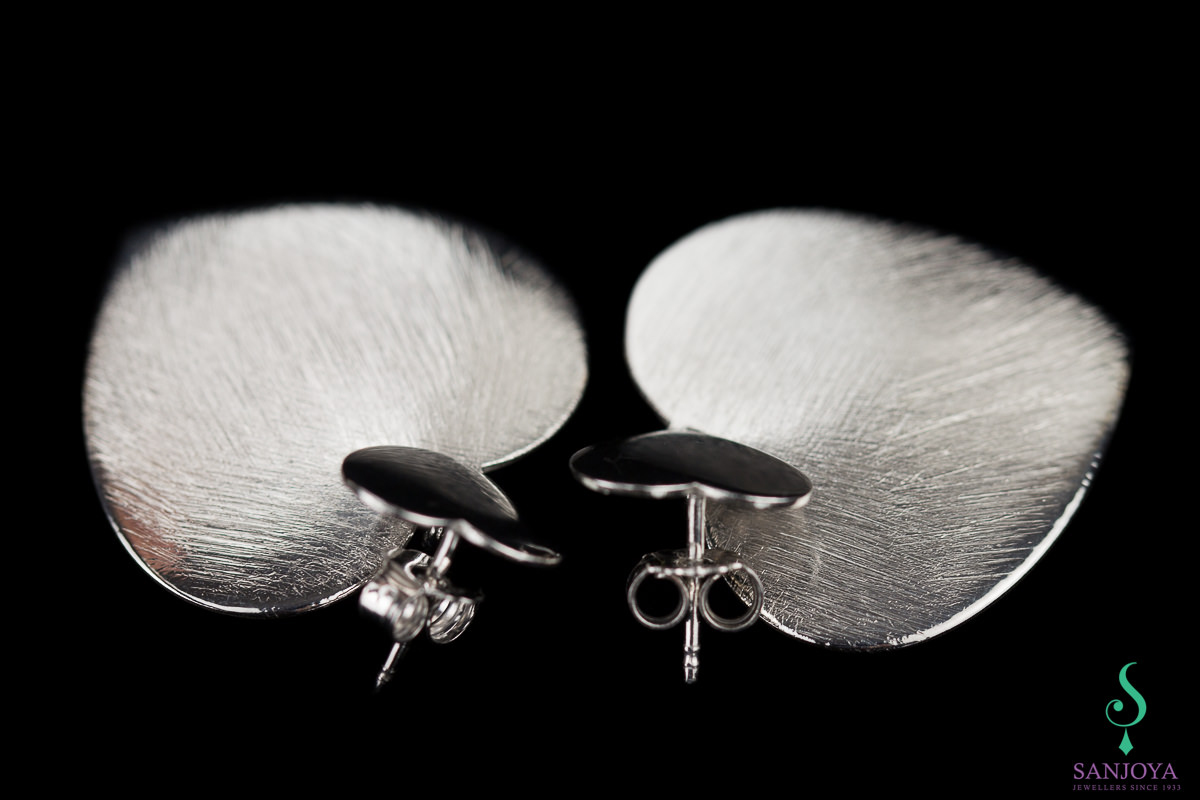 Silver heart-shaped earrings