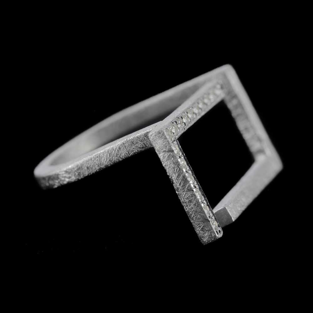 Rectangular ring of silver and zirconia